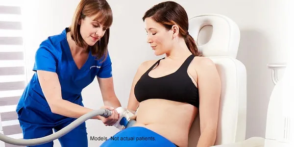 Doctor placing CoolSculpting device on patient