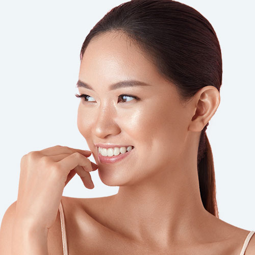 Asian Woman posing looking to her left | Hydroderm Facials